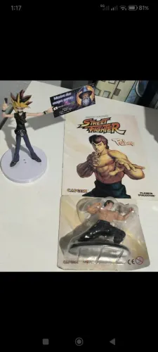Action figure feilong com fascículo