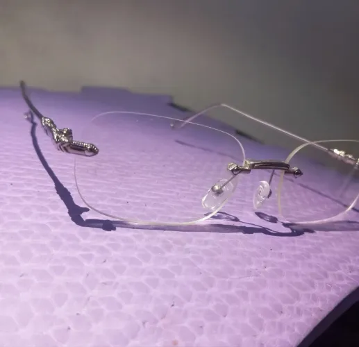 Óculos Lente Transparente com armação de prata