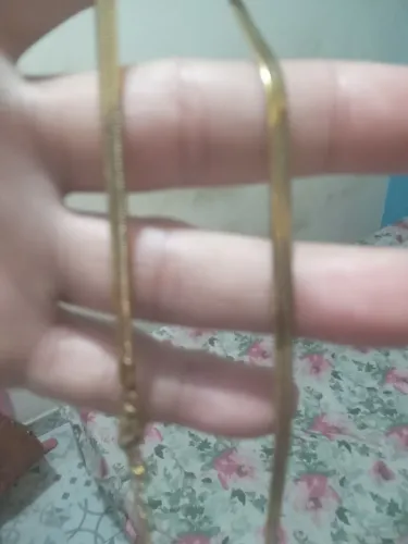 Cordão de aço dourado?