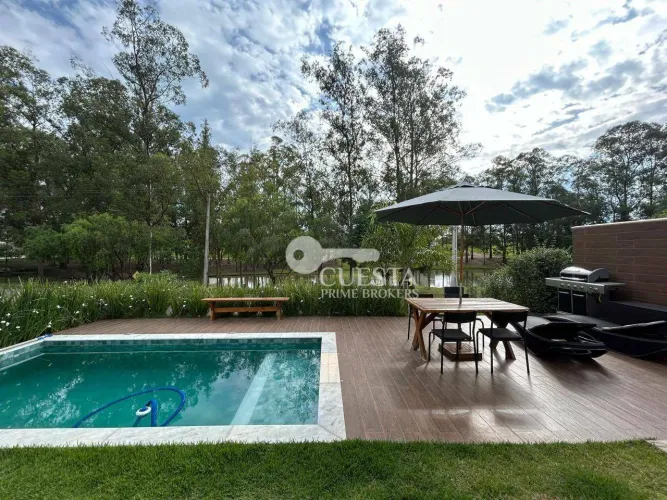 Casa com 3 dormitórios à venda, 236 m² por R$ 1.480.000,00 - Condomínio Ninho Verde I Eco