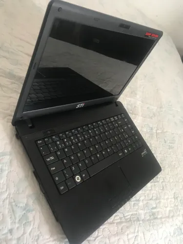 Notebook com para retirada de peça