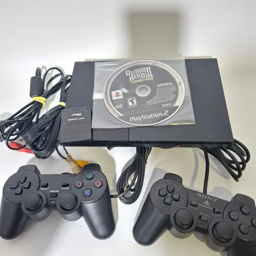 Playstation 2 slim bloqueado com guitar hero 3