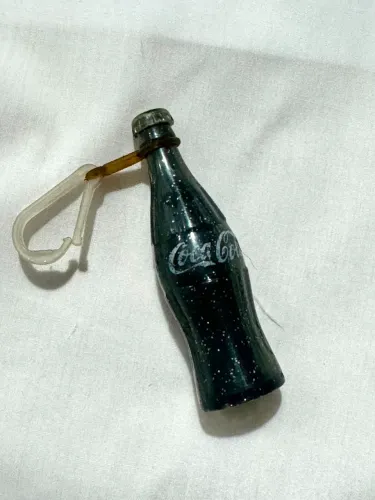 Antiga garrafinha chuveiro da coca