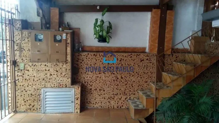 Terreno com 2 casas na Vila Moraes