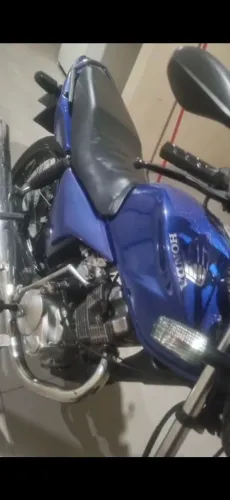 Vendo titan ks 2004 col freio a disco na frente doc no 26 no meu nome so transferir 