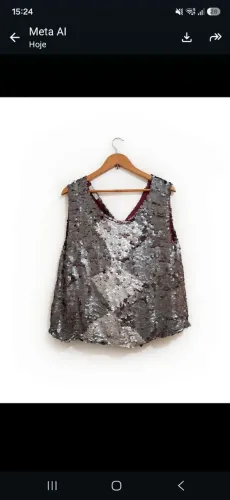 Blusa da Animale M veste 40/42 com lantejoulas em tons de prata.