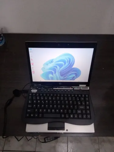 Notebook HP i7 Ssd120gb 4gb memória RAM Formatado Windows 11 funcionando leia abaixo