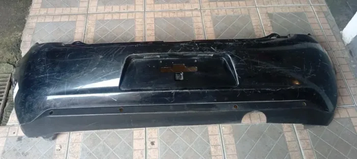 PARACHOQUE TRASEIRO CITROEN C3 13/21 DETALHE NA GARRA 