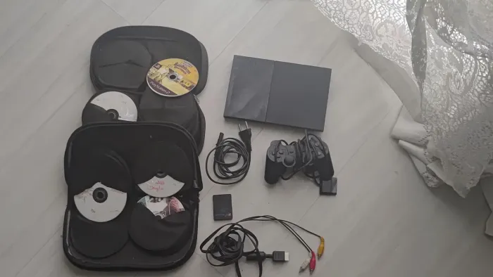 PS2 COM MAIS DE 50 JOGOS
