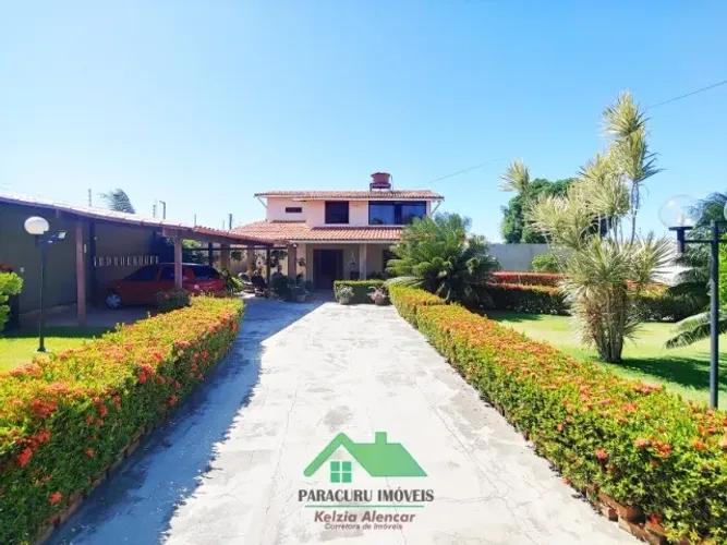 Linda casa com piscina e cinco quartos no Paracuru bem localizada proxima ao Forum.