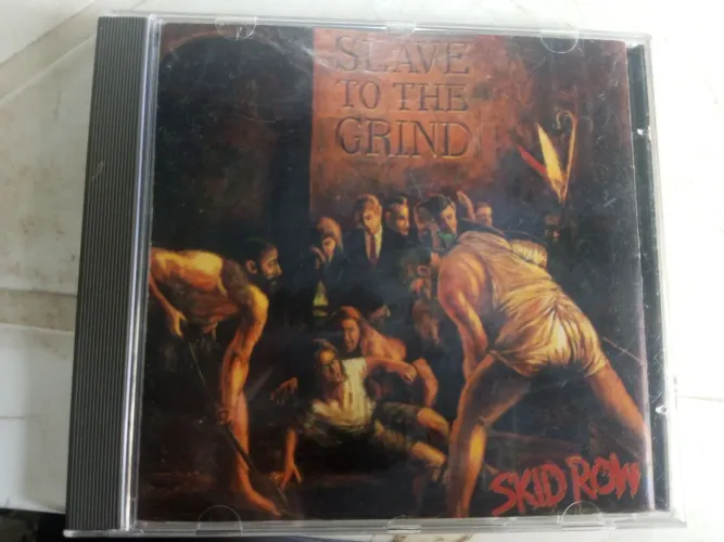 cd skid row (importado japan) - slave to the grind