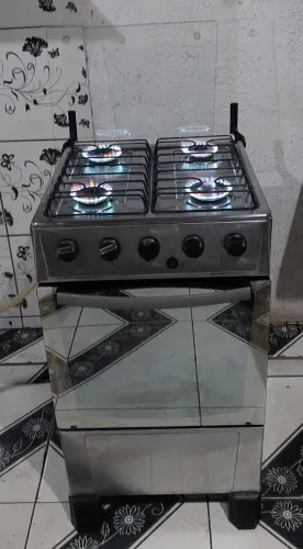 Excelente fogão Atlas de quatro bocas inox e espelhado automático conservado