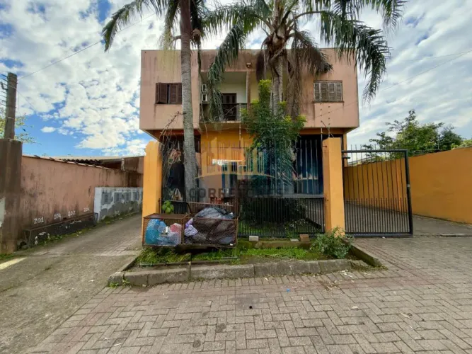 Casa sobrado, com 2 dormitorios e 1 vaga de garagem para alugar no Bairro Olaria em Canoas