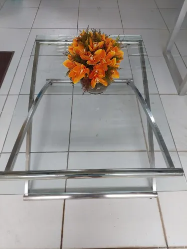 CENTRO DE INOX COM TAMPÃO DE VIDRO.