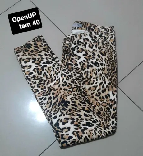 Calca jeans oncinha