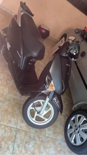 Moto em dia em meu nome , revisada com placa Mercosul