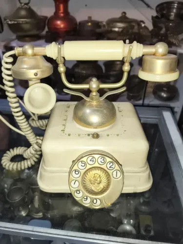 Telefone antigo em lata para decoração linda peça e obra de arte