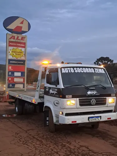 Caminhão prancha com asa delta 