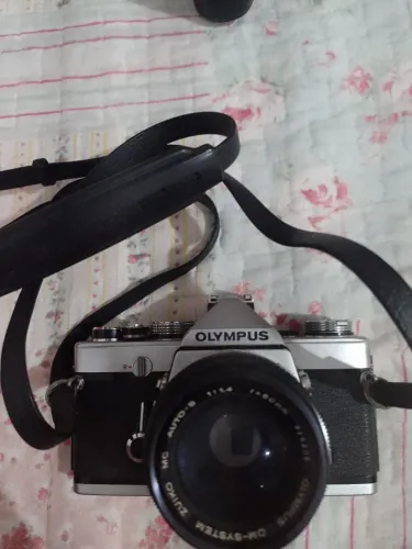 Máquina fotográfica analógica Olympus funcionando perfeitamente
