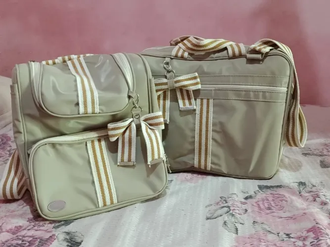 Bolsa para bebê a pequena e a grande em perfeito estado