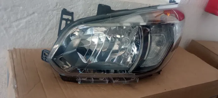 Farol spin esquerdo novo original cromo mix