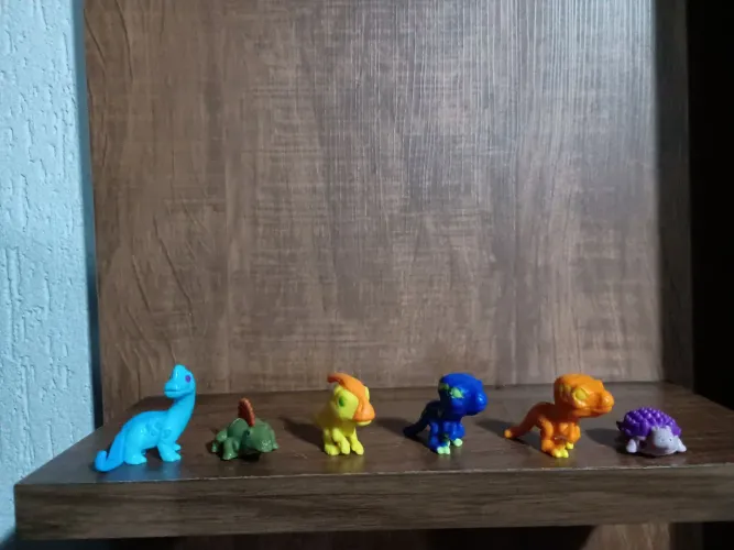 7 bonecos miniaturas dinossauros usados na condição das fotos