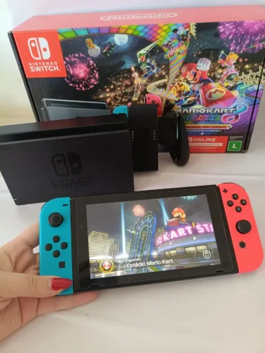 Nintendo switch V2 32 gb + 128 SD Desbloqueado
