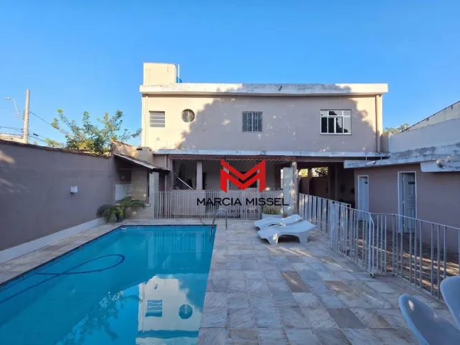 Casa com 4 dormitórios e piscina à venda, 400 m² área total por R$ 550.000 - Posse - Nova