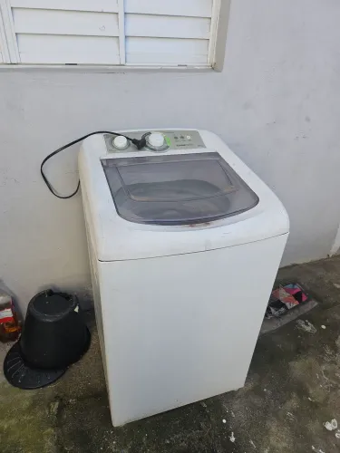 Máquina de lavar com defeito