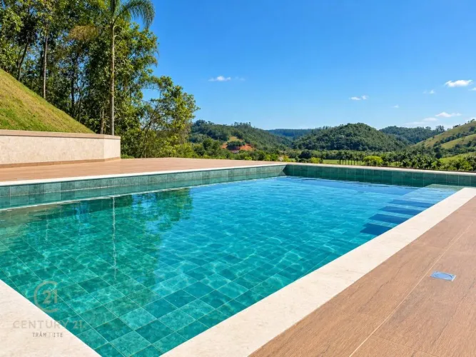 Casa com 3 dormitórios, 146 m² por R$ 850.000 - Bellard - Guararema/SP