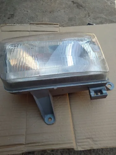 Farol lado esquerdo Hilux pick UP 2002 a 2004