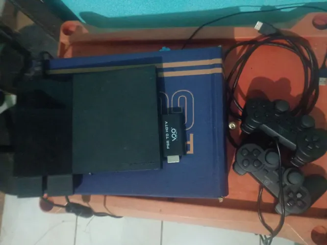 PS2 completo, 2 controle, cabo HDMI, 1 pen drive com 7 jogos