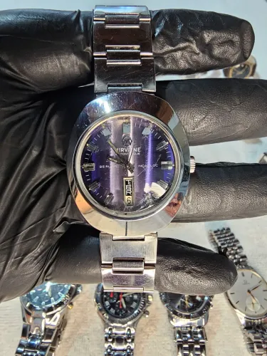 Relogio mirvaine automatico e a corda de mostrador roxo