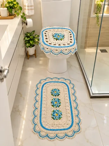 Jogo de banheiro em crochê azul com flor