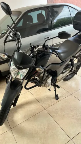 Moto única dona + acessórios