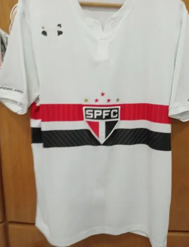 Camisa UnderArmour São Paulo Futebol Clube. Detalhe na marca desgastado no peito.