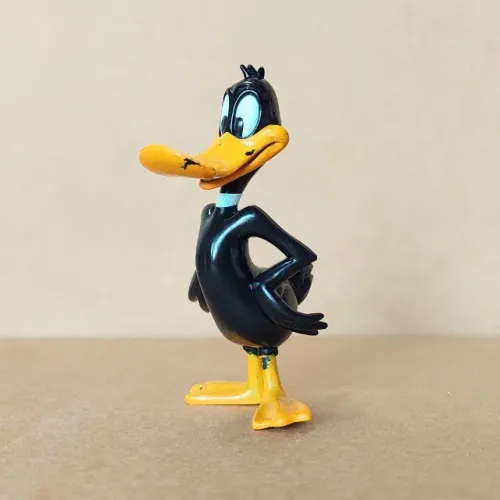 brinquedo - boneco miniatura looney tunes patolino (usado)