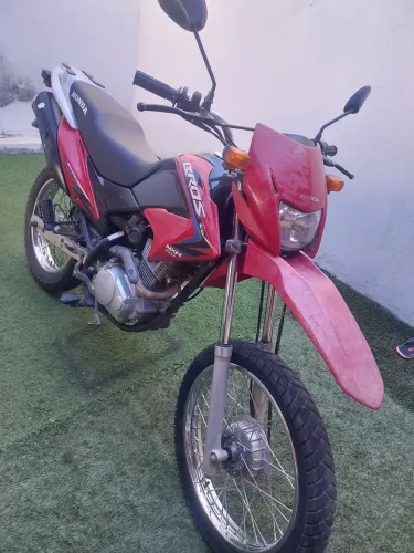 Moto top,toda revisada,moto de procedência,único dono,documento tudo ok,só transferir 