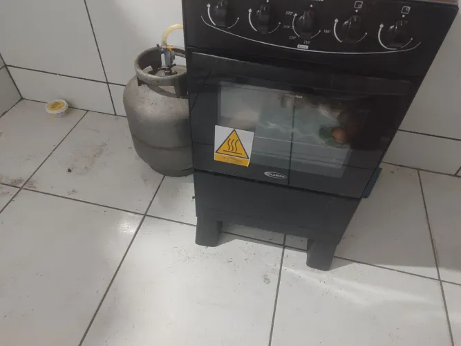 Fogão com o btjao 
