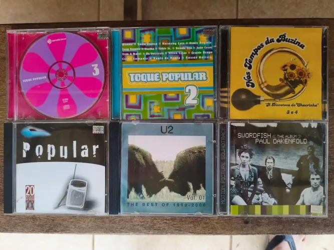 CDs e DVDs originais R$ 10.  6 por R$ 50