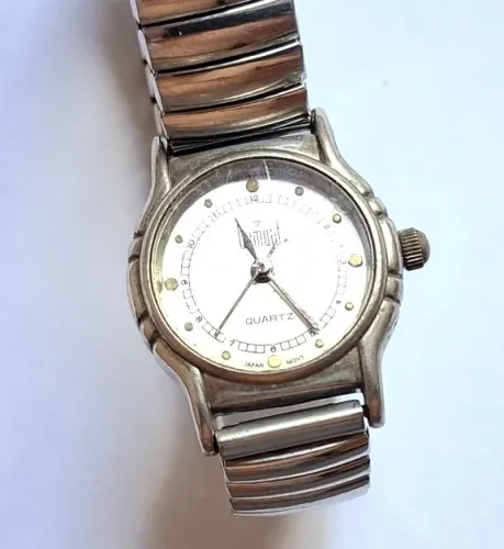 Relógio feminino marca DUMONT, com pulseira expansível, com maquina nova