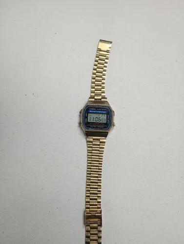 relógio casio vintage a168 dourado