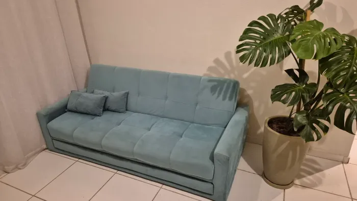 Sofá cama verde turquesa 