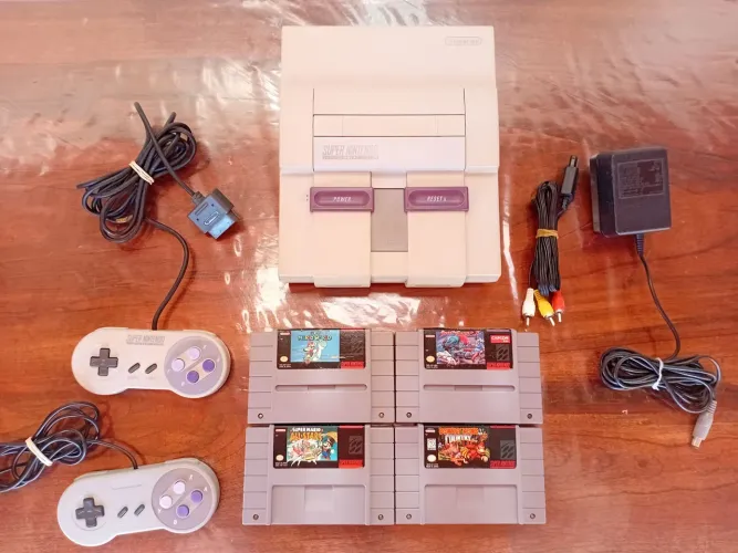 Super Nintendo com 4 cartuchos originais fonte original e 1 controle original