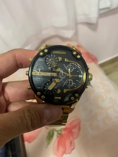 Relógio diesel dourado original.