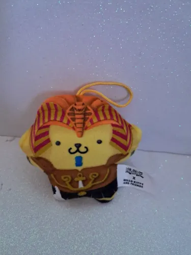Pelúcia miniatura Pompompurim (Hello Kitty)Yu-Gi-Oh 