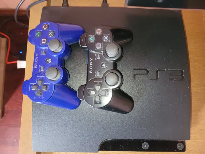 PS3 Slim + 2 Controles + 25 Jogos Originais