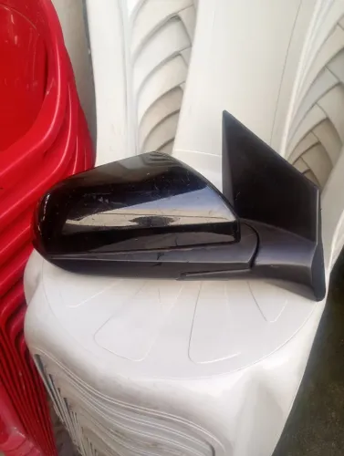 Ao primeiro Retrovisor do veículo Onix Novo