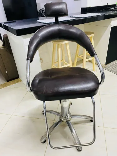 Cadeira de cabeleireiro/a