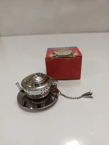 Antigo coador de chá inox